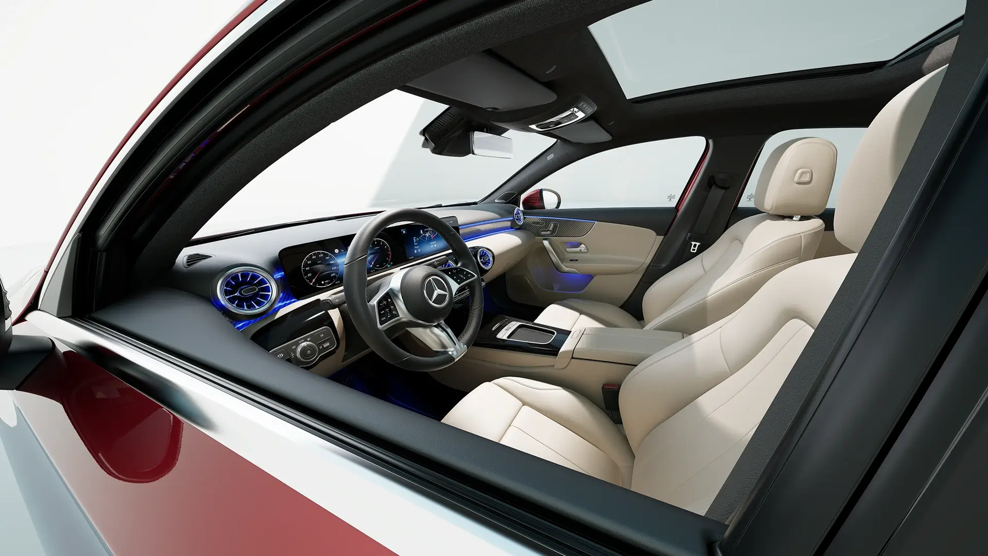 Mercedes-Benz A-sedanin kojelauta ja etuistuimet vasemmalta ulkoa kuvattuna.