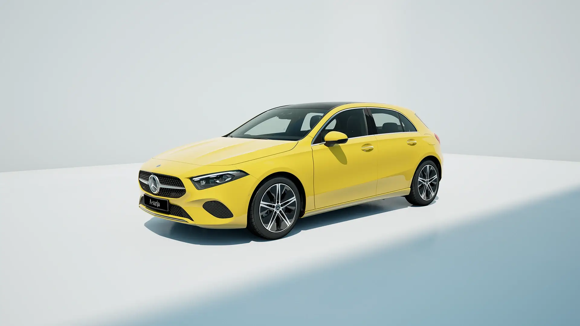 Keltainen Mercedes-Benz A-sarja sivusta kuvattuna.