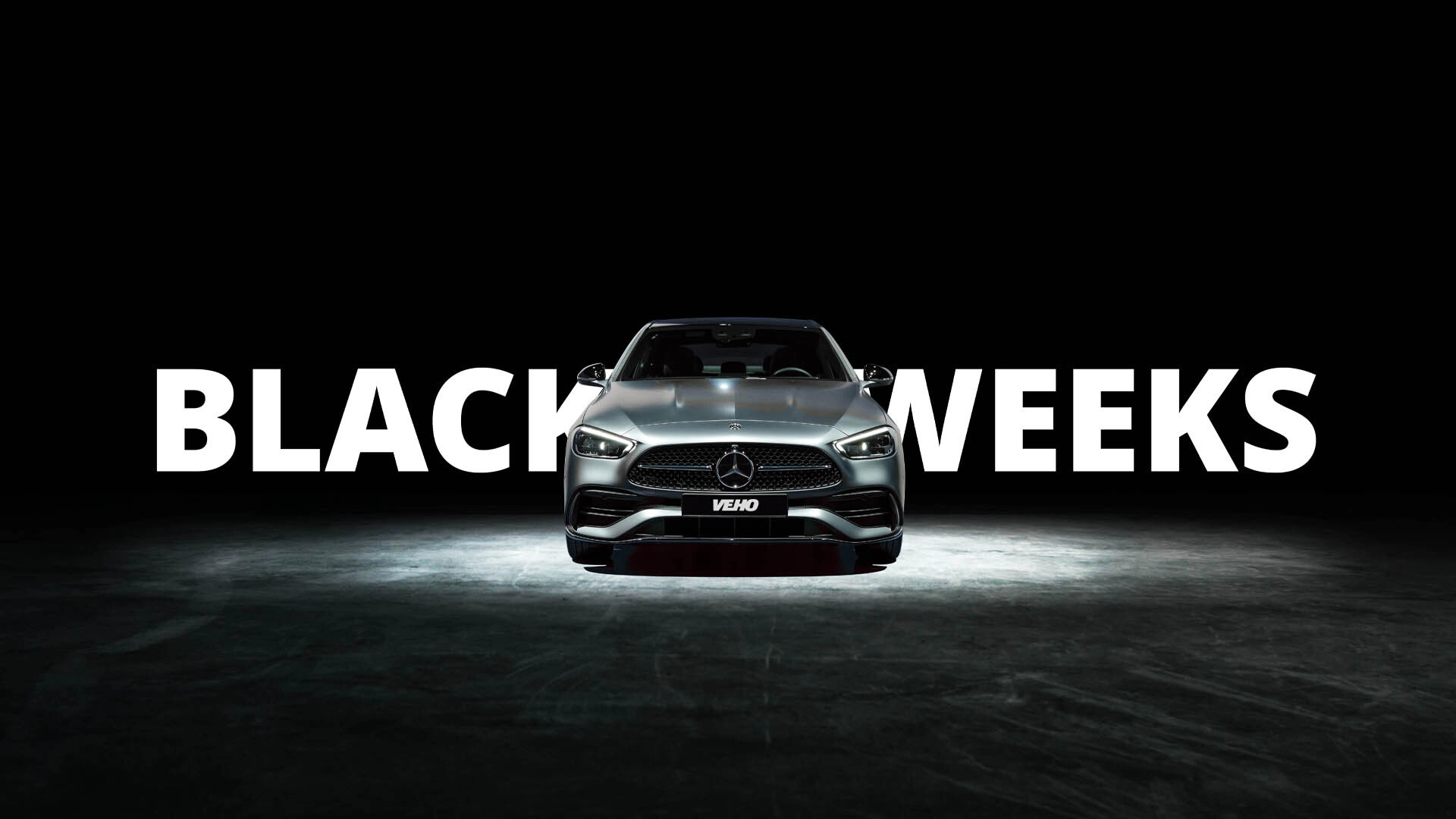 Mercedes-Benz mustaa taustaa vasten Black weeks tekstillä