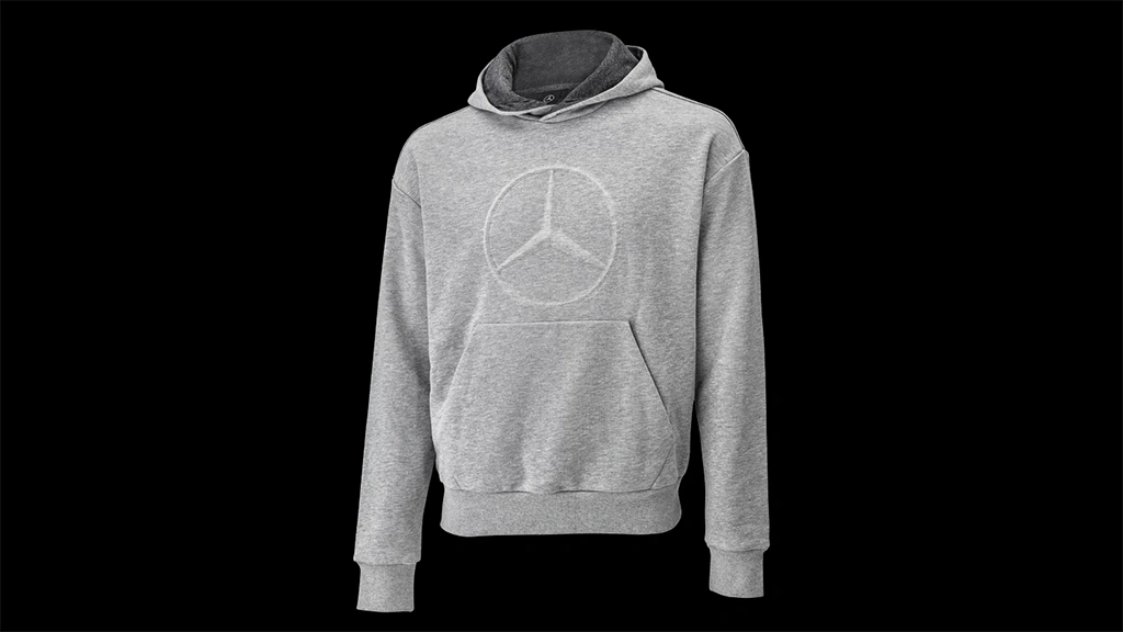 Mercedes-Benz-huppari unisex-istuvuudella sekä upealla prässätyllä Mercedes-tähdellä.